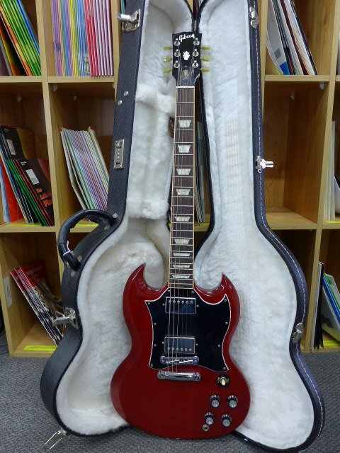 Gibson SG Standard. Made in USA in 2010 and in pristine condition in original case. (Case has stickers on it)